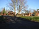 Road to St Nicolas School and Taplow Village Hall.
School House on the left, Village Hall and part of Village Green on the right.
Clump of trees in the centre.