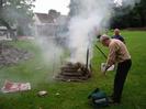 Village Green.
Bill Ball and Jane Curry with cooking fire.