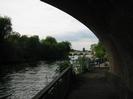 Looking north along the River Thames to Maidenhead Bridge.
Trees on Guards Club Island on the left.