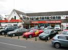 Station Garage Taplow Mitsubishi showroom.
Two-storey building with windows set into tile roof.
Cars on forecourt.