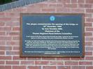 Plaque on bridge:
This plaque commemorates the opening of this bridge on 16th December 1999 by Jean Venables MBE, Chairman of the Thames Regional Flood Defence Committee
A new channel of the river thames flows beneath the bridge, created by the Environment Agency to relieve flooding in the areas of Maidenhead, Windsor and Eton.
The bridge was built and installed on behalf of the Environment Agency by Edmund Nuttall Ltd, under the supervision of Railtrack. The 8,000 tonne structure was built alongside the rail embankment and jacked into position continuously over a five week period, beginning in July 1999. The embankment was frozen prior to the work to secure it during the operation and trains continued to run overhead throughout. This is the first rail bridge to be installed using this technique.
The arches have been designed to complement Brunel's original bridge over the River Thames at Maidenhead, built in 1839.
