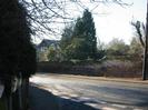 Looking down Berry Hill from its junction with Rectory Road.
The New House visible through the trees.