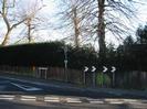The junction of Rectory Road and Berry Hill, showing the chevron warning sign on the bend.