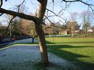 Eastern part of Village Green.
Trees and frost on the left.
Barn and school on the right.