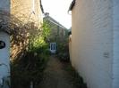 Path between two houses leading to Elm View