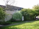 16 Cedar Chase.
Trees and lawn in front of house.
