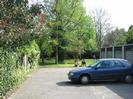 Cedar Chase garages.
Trees and people in the distance.