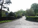 Entrance to High Street.
Hedges on both sides of the road.
House visible on left.
Sign warning `Unsuitable for heavy goods vehicles'.