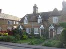 Church Cottages.
Cottages built from sandy-coloured brick with inset decoration in red brick.
