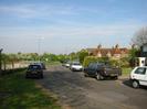 Looking towards Hill Farm Road.
Wire fence and allotment gardens on left.
Parked cars.
Rear of Church Cottages and one of the Buffins houses on the right.