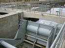Sluice gate at the head of the Jubilee River.
Large radial steel gate with hydraulic ram.
Concrete structures with metal railings.