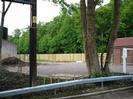 New car-park beside Jubilee River.
Large trees.
Weir control building on right.