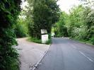 Looking north on Mill Lane.
Entrance to paper mill layby on left.
Trees on both sides.