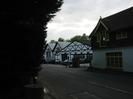 Looking south on Mill Lane.
Black and white boathouses.
House on the right.