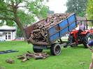 Village Green, 06:40 3rd June 2002.
Andy McKenzie tipping wood for ox-roast.