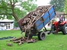 Village Green 06:40 3rd June 2002.
Andy McKenzie tipping wood for ox-roast.