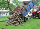 Village Green 06:40 3rd June 2002.
Andy McKenzie tipping wood for ox-roast.