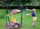 Village Green 07:45 3rd June 2002.
Jane Curry turning the meat for the party.