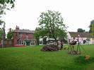 Village Green, 3rd June 2002.
Ox-roast in progress.
Pub and houses in the background decked with flags for the Queen's Jubilee.