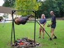 Village Green, 09:10 3rd June 2002.
Ox Roast in progress.
Jane Curry and Andrew Findlay stoking the fire.