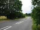 Boundary Road.
Trees both sides.
Footpath on left.
Traffic island.