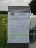 Notice on gatepost directing travellers to leave the recreation ground