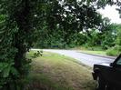 Eastern end of Institute Road.
Grass verge with car and overhanging trees.
Pedestrian on Hitcham Road.