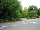 The eastern end of Approach Road.
Trees on far side of road, around entrance to sports club.