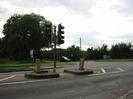 Road junction with traffic lights on central island.
Trees in the background with sign to Dorney Reach.
Sign: "No access to Dorney Lake construction traffic"
Road-name sign for Marsh Lane.