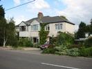 Caversham and Kendrick: a pair of semi-detached houses with light-coloured walls and dark slate roofs.