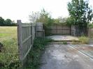 Fences surrounding drains and manholes.