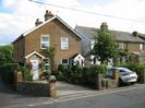 Woodlands: semi-detached house with patterned brickwork.