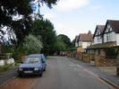 Looking east on Ye Meads.
Road with parked van.
Houses on the right.