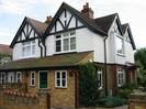 Pair of houses: brick and render.