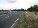 Looking north on Marsh Lane.
Road with bridge.