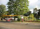 Looking south across the A4 Bath Road.
Shell filling station, large trees and red pillar box.